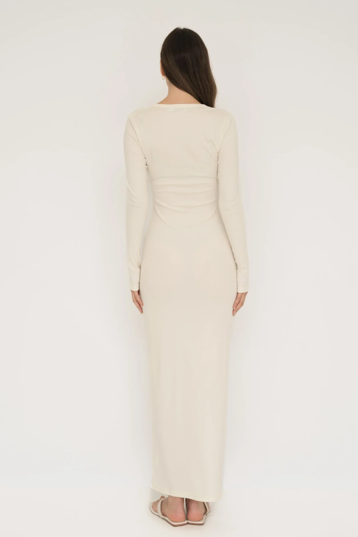Embrace effortless style with the Long Sleeve Henley Maxi Dress from AOCO. Featuring a classic button front and soft fabrics, it's your new daily essential.