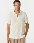 Stay effortlessly cool in the Deon Linen Jersey Shirt by AOCO. Made from a breathable, lightweight blend, this classic button-down is an everyday essential.