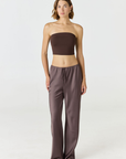 Elevate your warm-weather wardrobe with the Edie Bandeau Top in Espresso from AOCO. This chic strapless design offers a flattering fit and endless style possibilities.