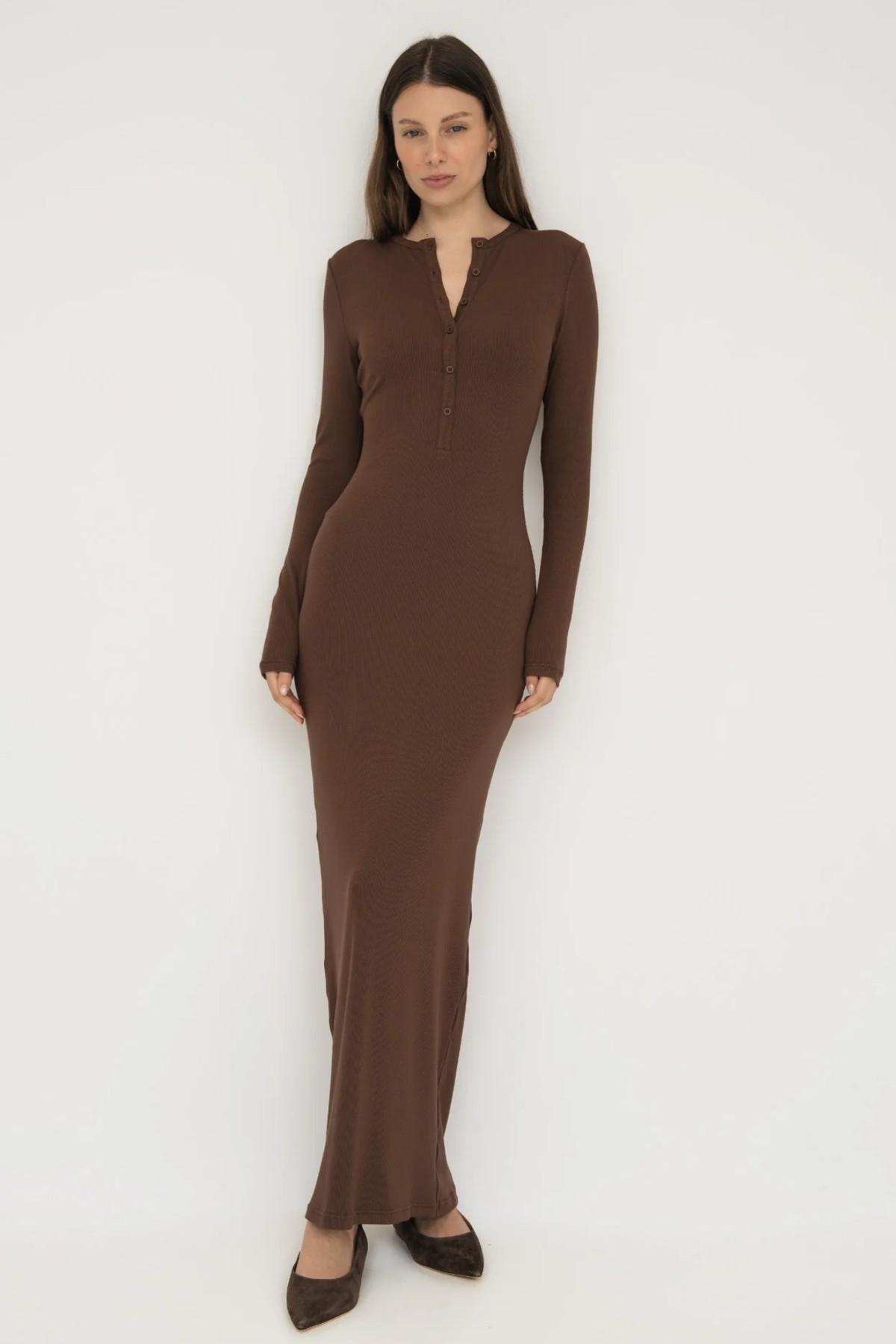 Embrace effortless style with the Long Sleeve Henley Maxi Dress from AOCO. Featuring a classic button front and soft fabrics, it's your new daily essential.