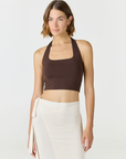 Refresh your summer wardrobe with the Mia Cropped Halter from AOCO. Featuring a chic halter neckline and a flattering cropped fit, it's a warm weather must.