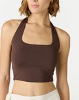 Refresh your summer wardrobe with the Mia Cropped Halter from AOCO. Featuring a chic halter neckline and a flattering cropped fit, it's a warm weather must.