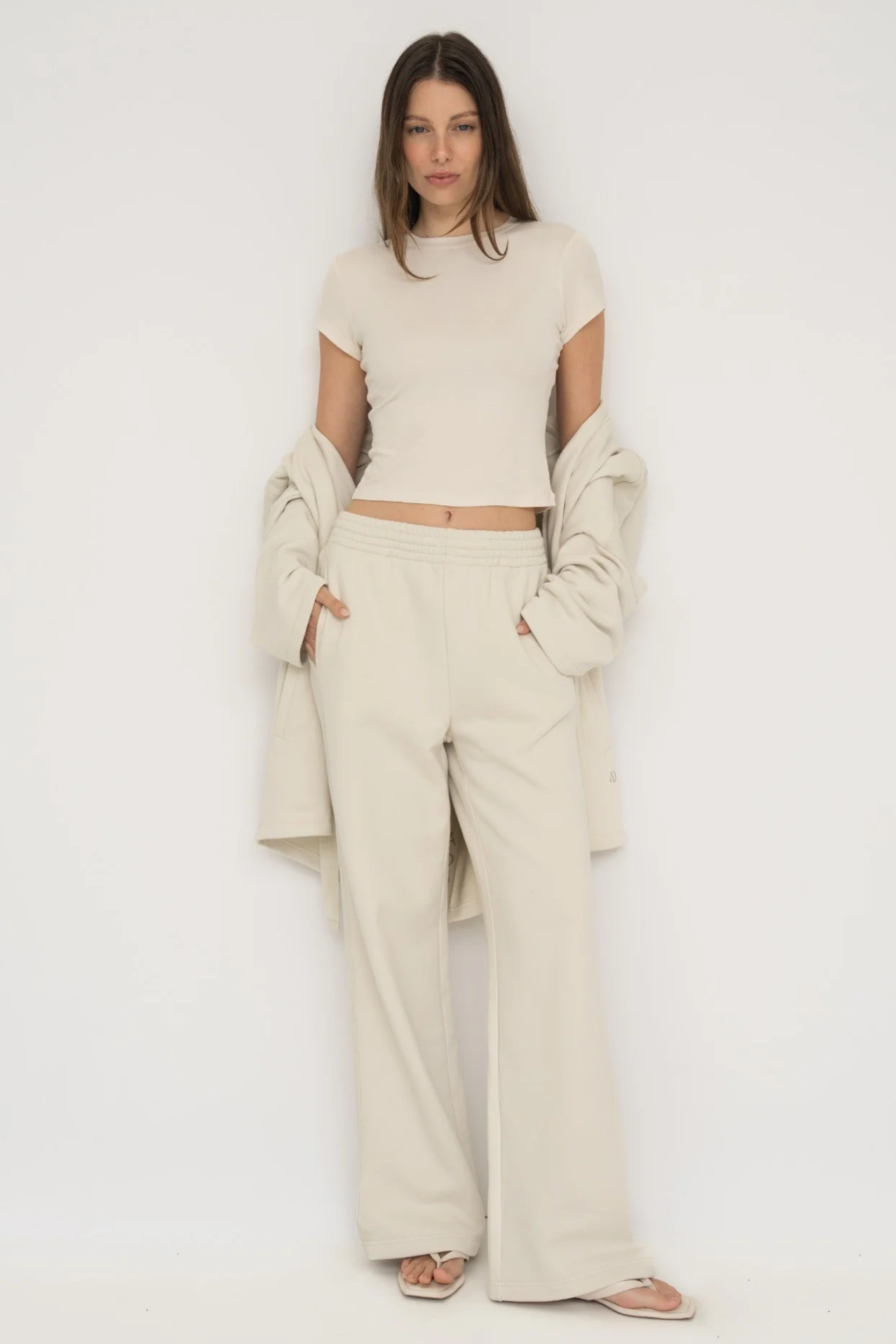 Upgrade your downtime with the French Terry Wide Leg Pants from AOCO in cream. Crafted from ultra-soft fabrics, these chic bottoms provide a flattering, relaxed fit.