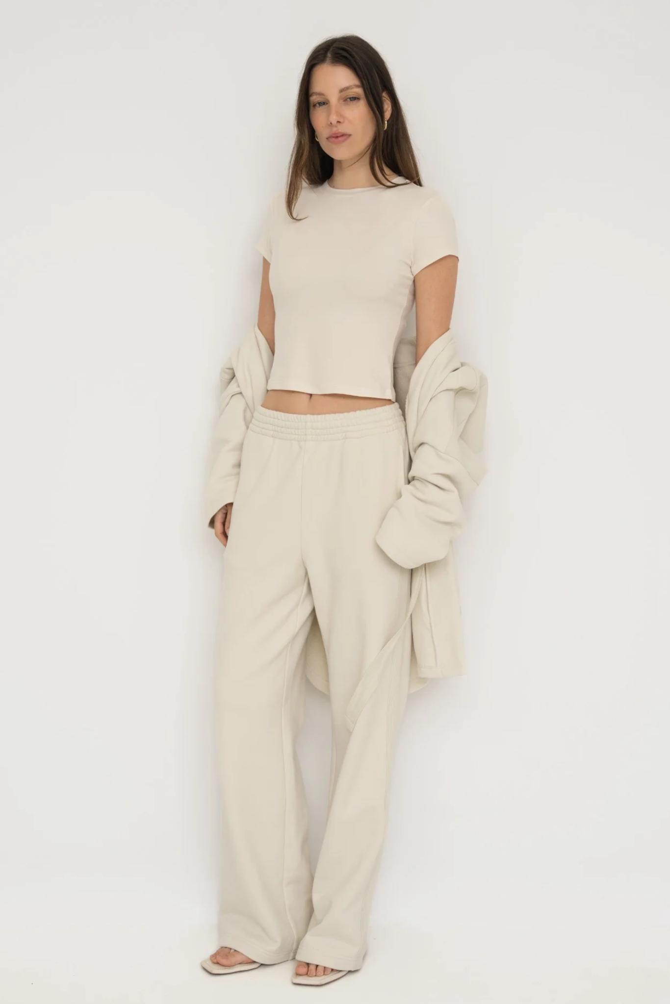 Upgrade your downtime with the French Terry Wide Leg Pants from AOCO in cream. Crafted from ultra-soft fabrics, these chic bottoms provide a flattering, relaxed fit.