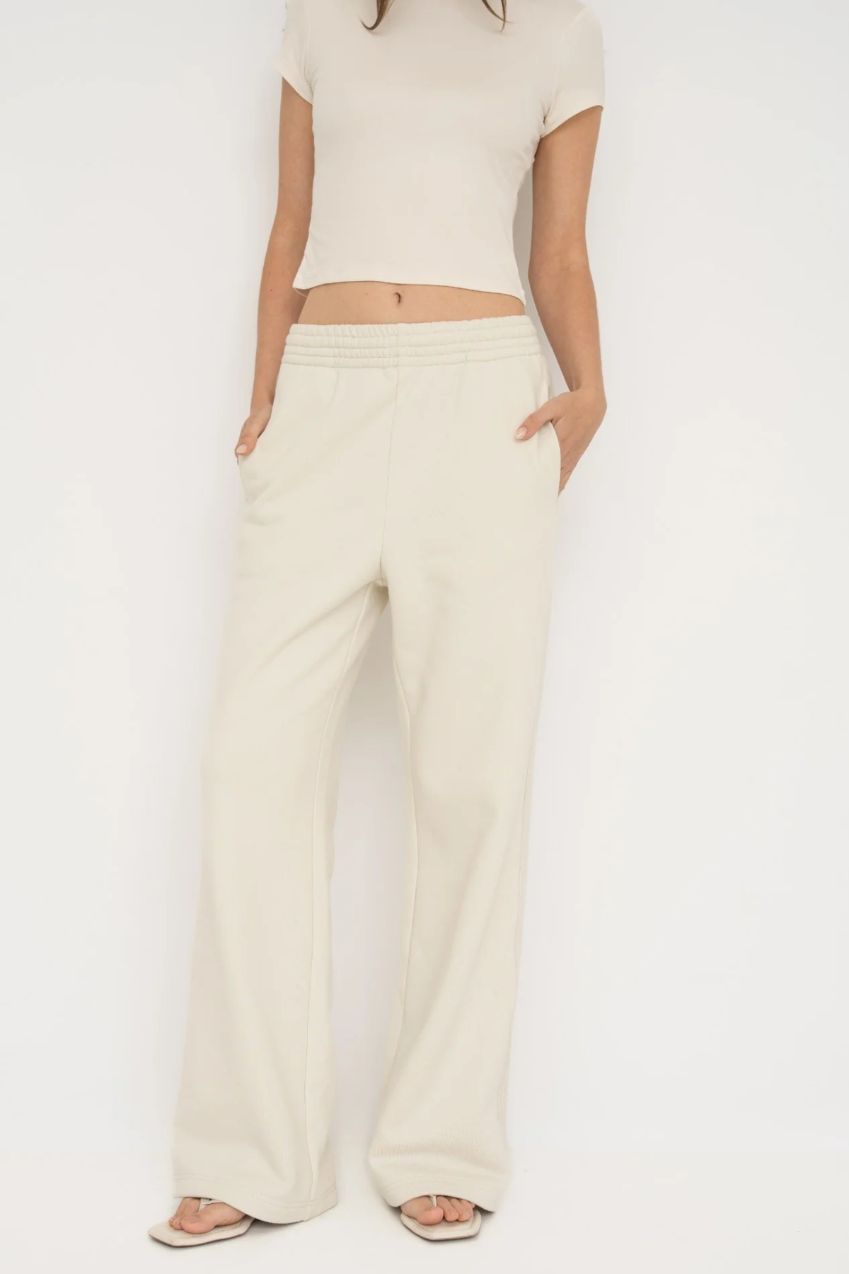 Upgrade your downtime with the French Terry Wide Leg Pants from AOCO in cream. Crafted from ultra-soft fabrics, these chic bottoms provide a flattering, relaxed fit.