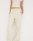 Upgrade your downtime with the French Terry Wide Leg Pants from AOCO in cream. Crafted from ultra-soft fabrics, these chic bottoms provide a flattering, relaxed fit.