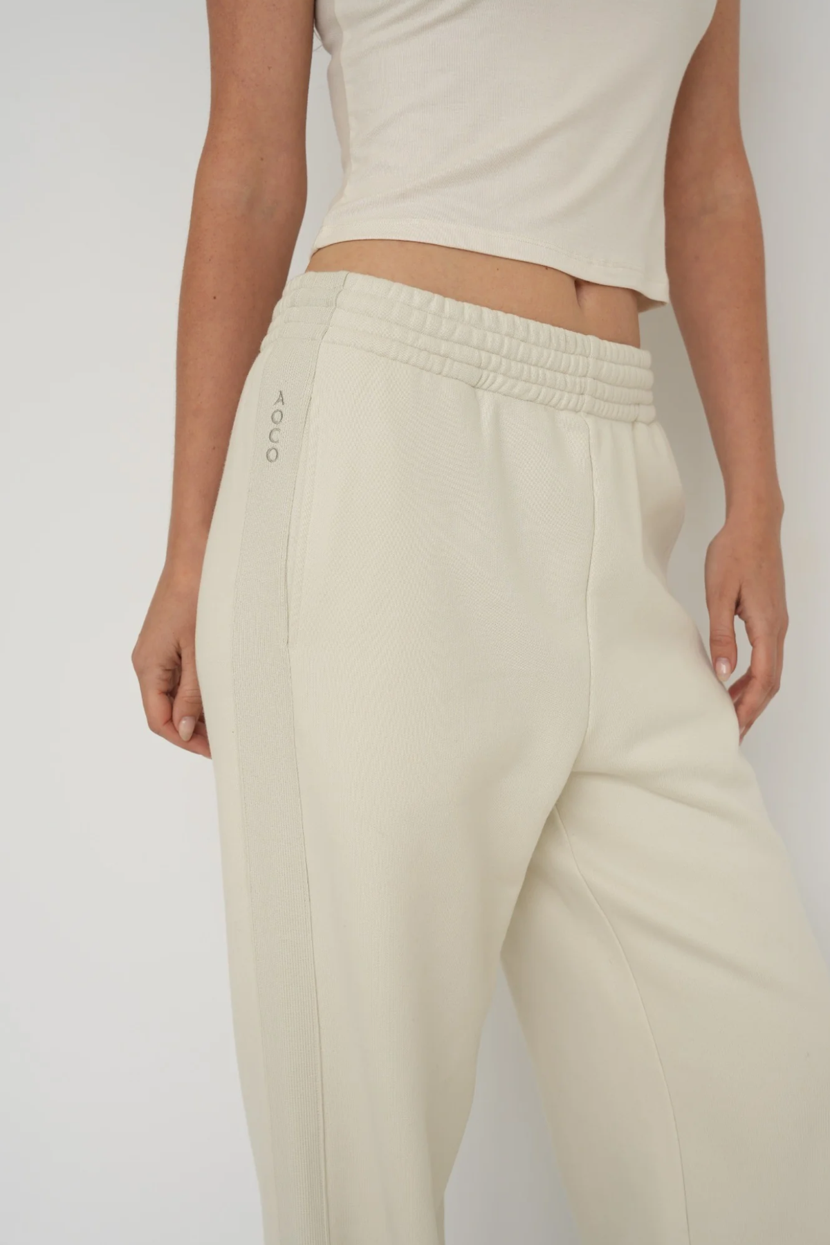 Upgrade your downtime with the French Terry Wide Leg Pants from AOCO in cream. Crafted from ultra-soft fabrics, these chic bottoms provide a flattering, relaxed fit.
