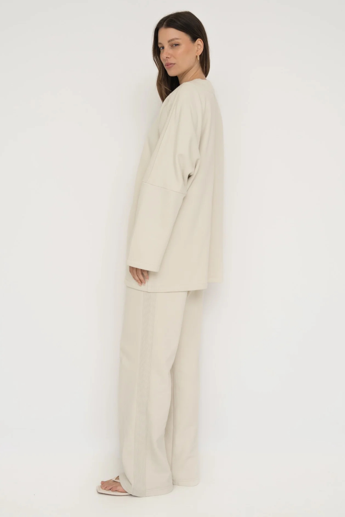 Upgrade your downtime with the French Terry Wide Leg Pants from AOCO in cream. Crafted from ultra-soft fabrics, these chic bottoms provide a flattering, relaxed fit.