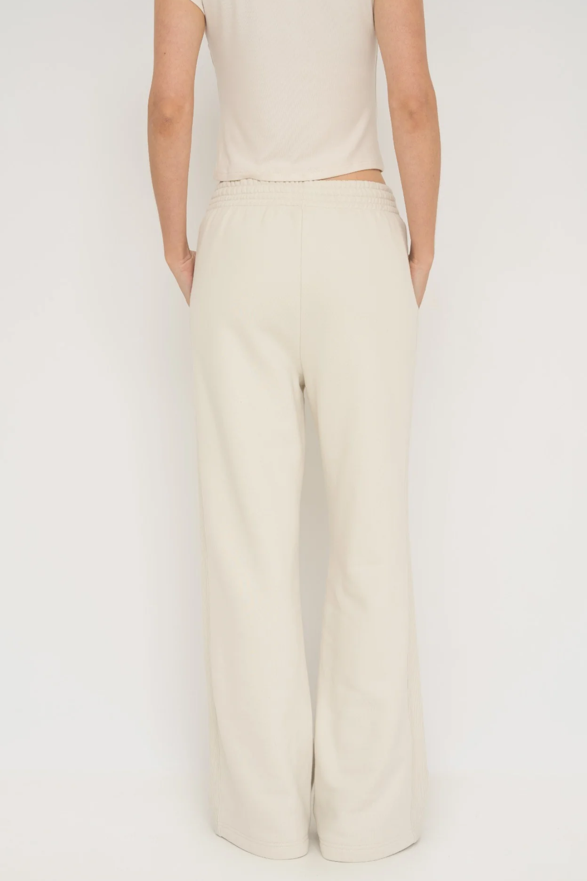 Upgrade your downtime with the French Terry Wide Leg Pants from AOCO in cream. Crafted from ultra-soft fabrics, these chic bottoms provide a flattering, relaxed fit.