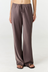 Experience ultimate comfort and sophistication with the Gia Silk Pants in brown by AOCO. These luxury trousers offer a flattering fit and an elegant, flawless drape.