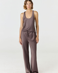 Experience ultimate comfort and sophistication with the Gia Silk Pants in brown by AOCO. These luxury trousers offer a flattering fit and an elegant, flawless drape.