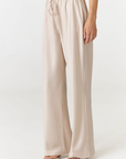 Crafted in premium silk, these straight leg pants Champagne / light beige silk pants move with a fluid drape and understated structure. A considered staple that balances ease and refinement for effortless everyday dressing. Pair with the Anaiis Silk Tank for an elevated set. 
