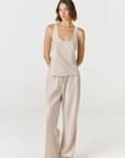 Crafted in premium silk, these straight leg pants Champagne / light beige silk pants move with a fluid drape and understated structure. A considered staple that balances ease and refinement for effortless everyday dressing. Pair with the Anaiis Silk Tank for an elevated set. 