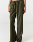 Experience ultimate comfort and sophistication with the Gia Silk Pants in olive by AOCO. These luxury trousers offer a flattering fit and an elegant, flawless drape.