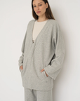 Wrap yourself in comfort with the French Terry Robe Jacket from AOCO. This versatile layer blends robe-like coziness with an everyday stylish jacket design.