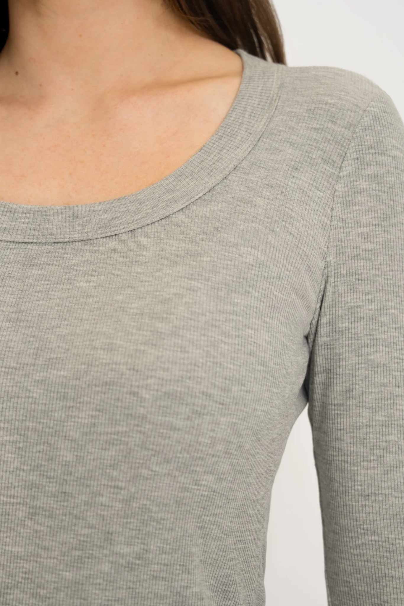 Upgrade your basics with the Long Sleeve Fitted Scoop Neck Top by AOCO. Made from soft, stretchy fabric, this flattering silhouette is a daily essential.