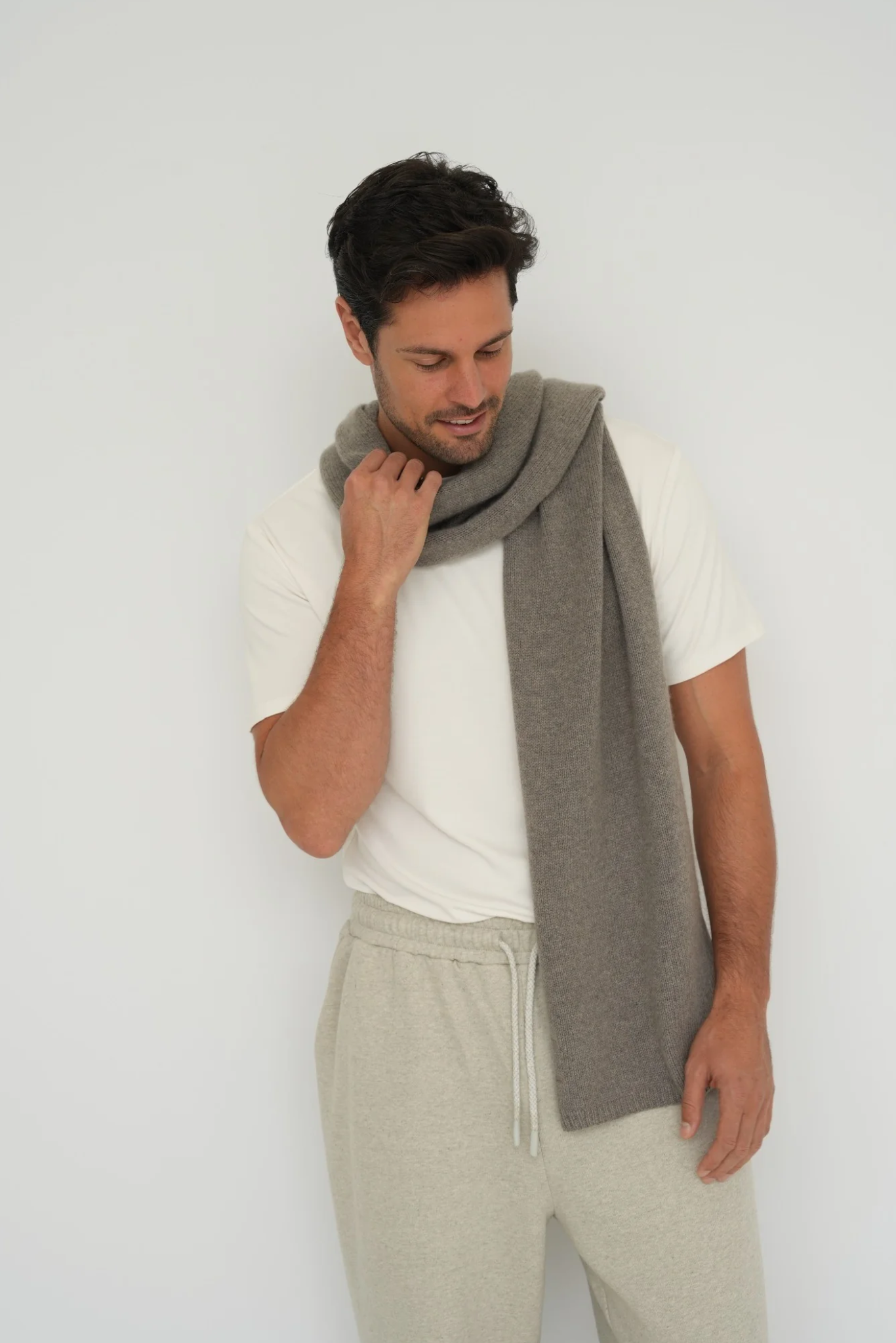Stay warm with the Cashmere Wool Blend Scarf from AOCO. Crafted from ultra-soft fibers, this elegant accessory is an essential cold weather staple.
