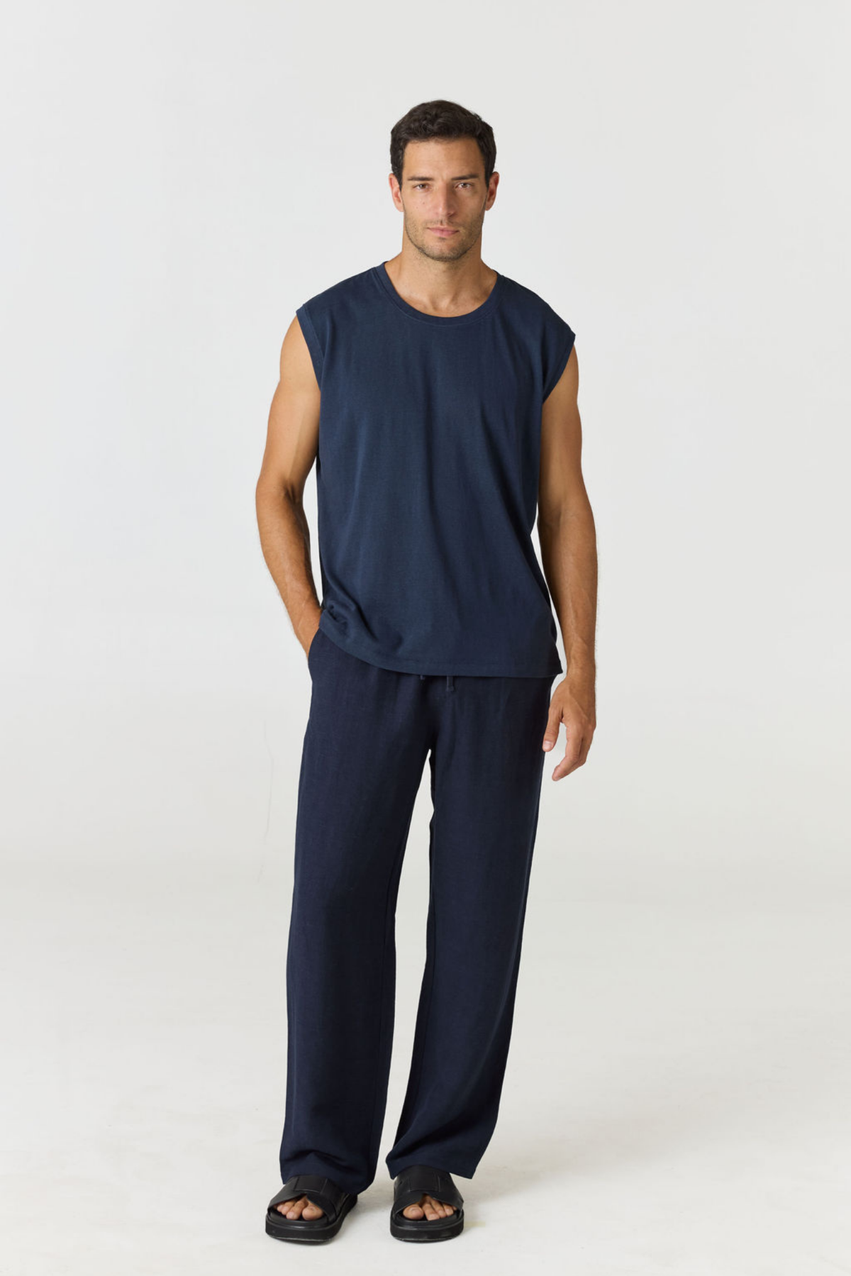Discover the chic Paros Linen Jersey Tank Vest by AOCO. Crafted from a soft, lightweight linen blend, this sleeveless top delivers ultimate warm weather comfort.
