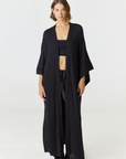 Relax in luxury with the Shura Kaftan from AOCO. This breezy, lightweight resort wear piece features an elegant, relaxed fit perfect for your next getaway.