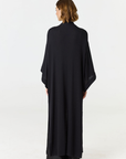 Relax in luxury with the Shura Kaftan from AOCO. This breezy, lightweight resort wear piece features an elegant, relaxed fit perfect for your next getaway.