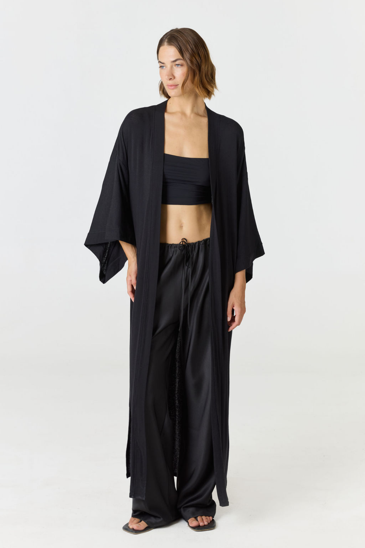 Relax in luxury with the Shura Kaftan from AOCO. This breezy, lightweight resort wear piece features an elegant, relaxed fit perfect for your next getaway.