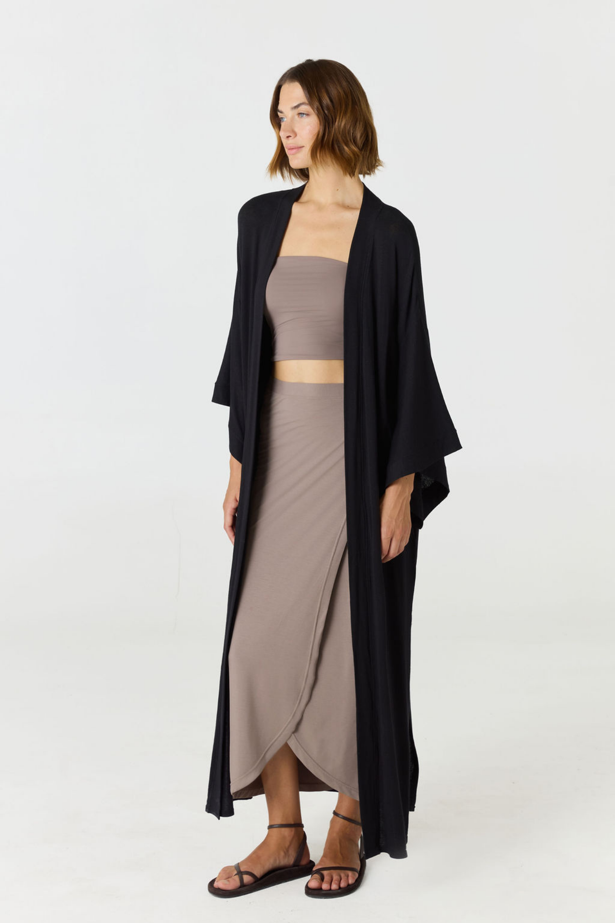 Relax in luxury with the Shura Kaftan from AOCO. This breezy, lightweight resort wear piece features an elegant, relaxed fit perfect for your next getaway.