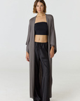 Relax in luxury with the Shura Kaftan from AOCO. This breezy, lightweight resort wear piece features an elegant, relaxed fit perfect for your next getaway.