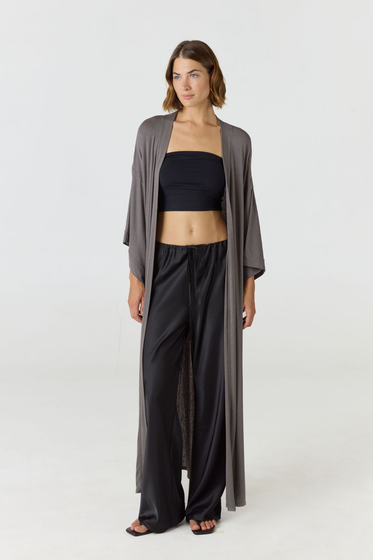 Relax in luxury with the Shura Kaftan from AOCO. This breezy, lightweight resort wear piece features an elegant, relaxed fit perfect for your next getaway.