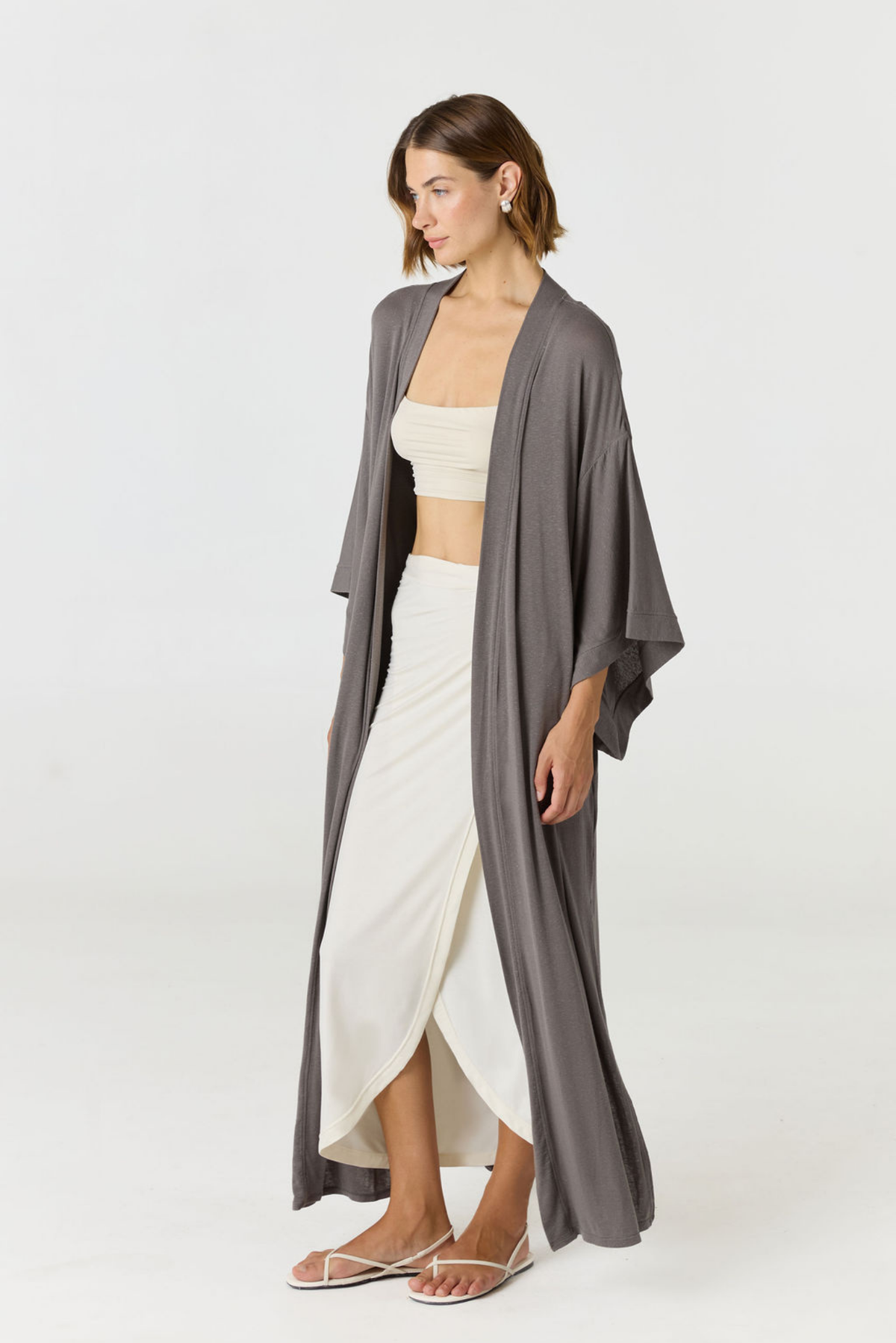 Relax in luxury with the Shura Kaftan from AOCO. This breezy, lightweight resort wear piece features an elegant, relaxed fit perfect for your next getaway.