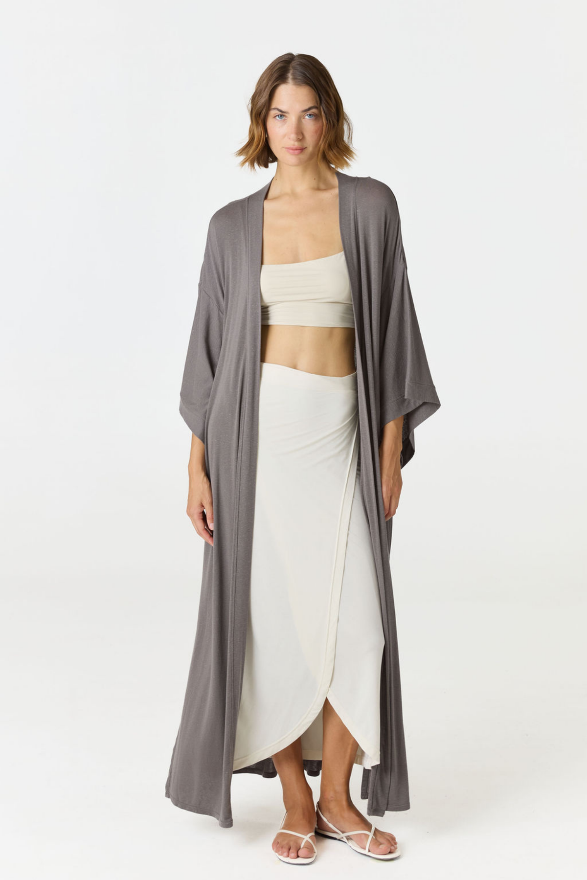 Relax in luxury with the Shura Kaftan from AOCO. This breezy, lightweight resort wear piece features an elegant, relaxed fit perfect for your next getaway.