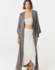 Relax in luxury with the Shura Kaftan from AOCO. This breezy, lightweight resort wear piece features an elegant, relaxed fit perfect for your next getaway.