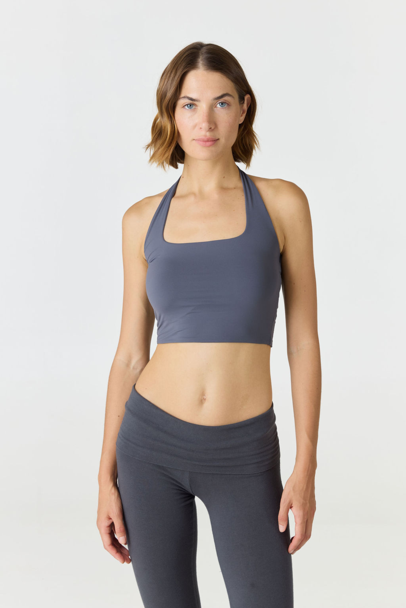 Refresh your summer wardrobe with the Mia Cropped Halter from AOCO. Featuring a chic halter neckline and a flattering cropped fit, it's a warm weather must.