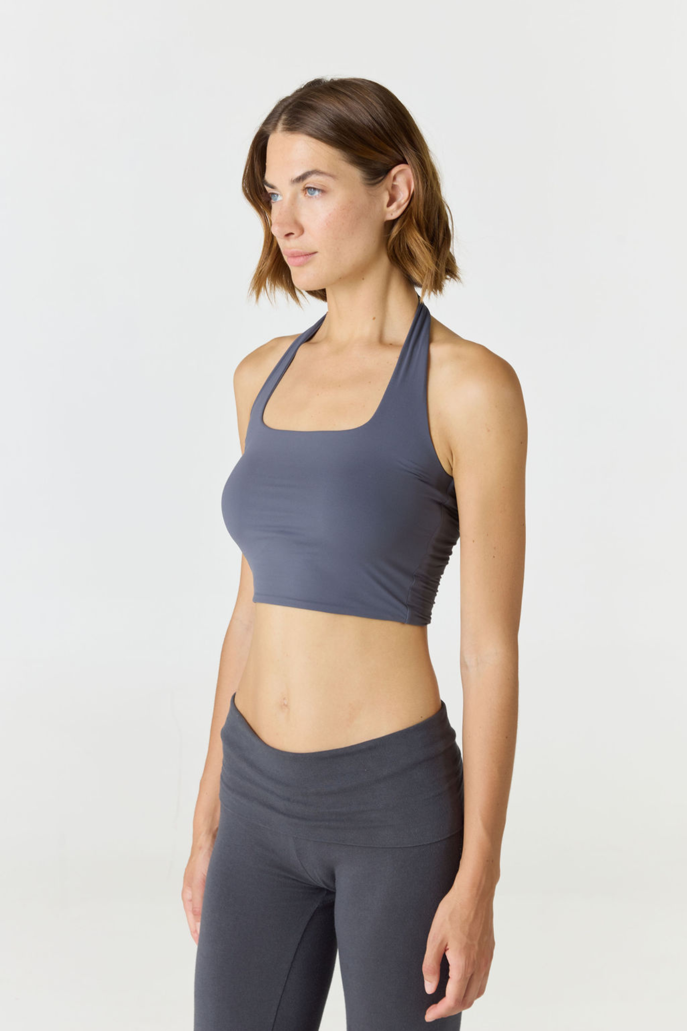 Refresh your summer wardrobe with the Mia Cropped Halter from AOCO. Featuring a chic halter neckline and a flattering cropped fit, it's a warm weather must.