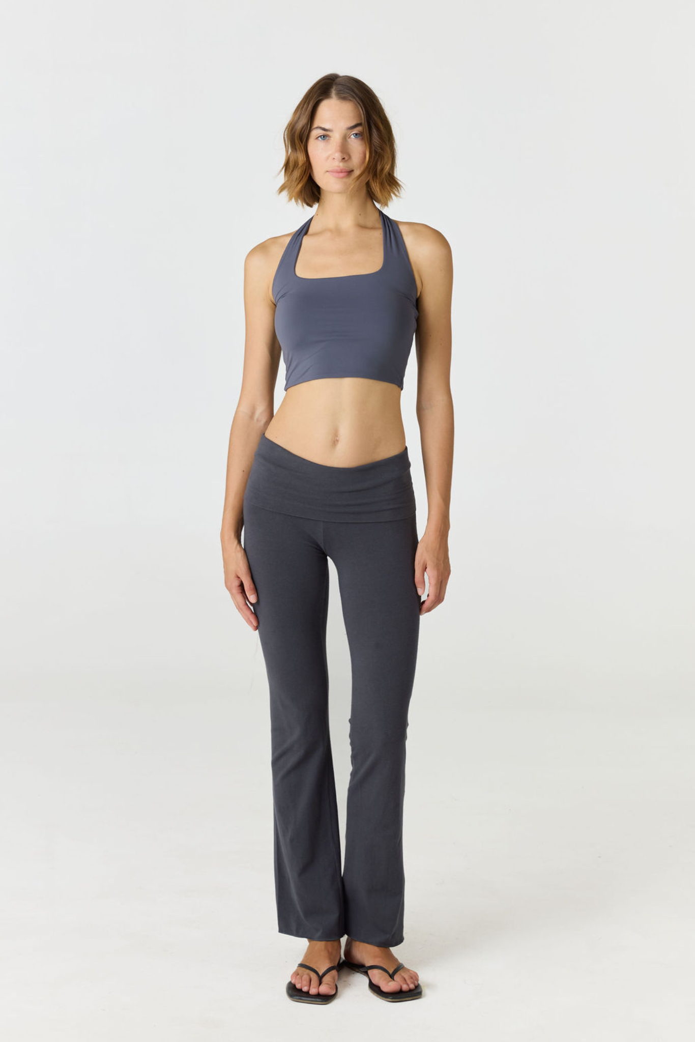 Refresh your summer wardrobe with the Mia Cropped Halter from AOCO. Featuring a chic halter neckline and a flattering cropped fit, it's a warm weather must.