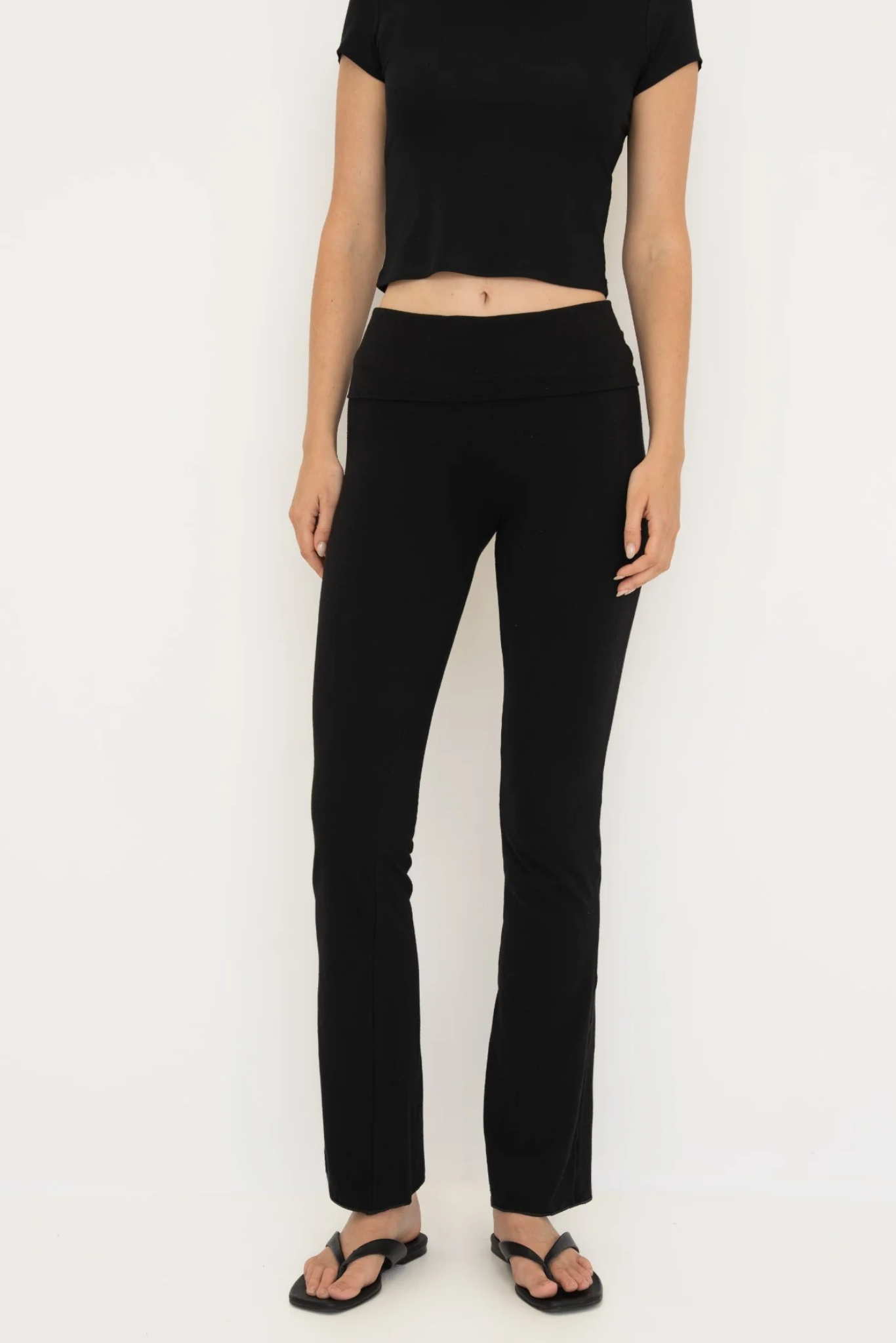 Soft organic cotton fold over leggings in black with a comfortable fold over waistband.