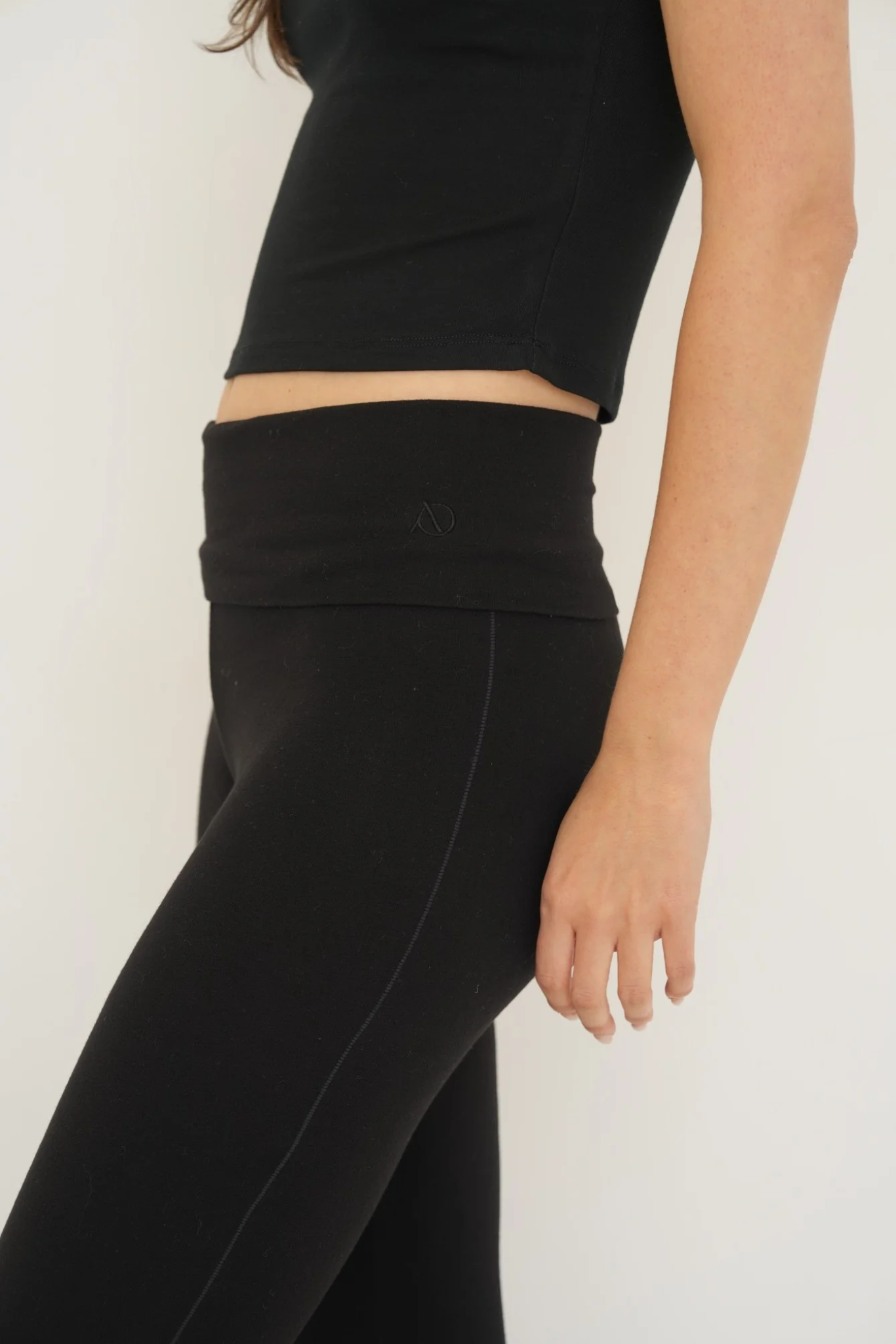Soft organic cotton fold over leggings in black with a comfortable fold over waistband.
