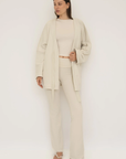 Soft organic cotton fold over leggings in cream with a comfortable fold over waistband.