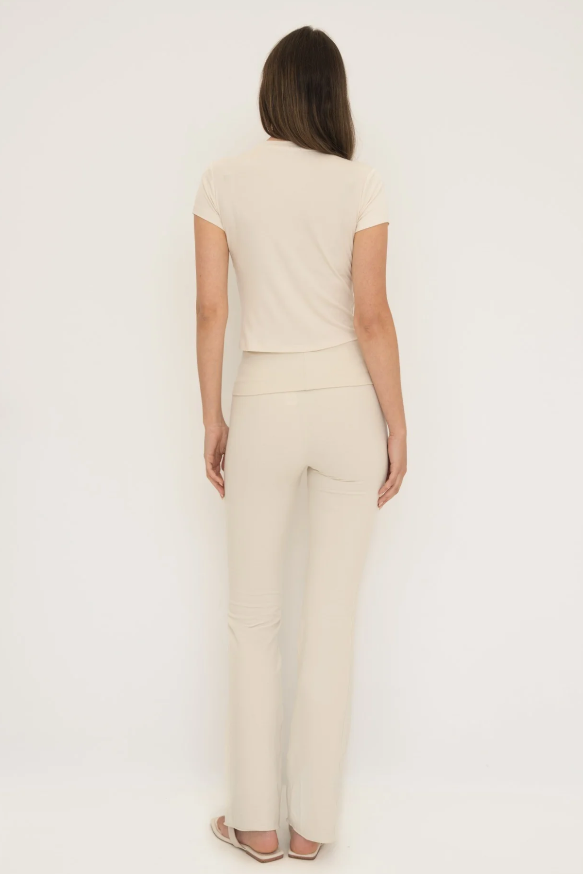 Soft organic cotton fold over leggings in cream with a comfortable fold over waistband.