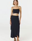 Step into summer with the flowy Soleil Wrap Skirt from AOCO. Featuring a lightweight fabric and an adjustable waist, this piece delivers effortless comfort.