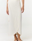 Step into summer with the flowy Soleil Wrap Skirt from AOCO. Featuring a lightweight fabric and an adjustable waist, this piece delivers effortless comfort.
