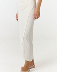 Step into summer with the flowy Soleil Wrap Skirt from AOCO. Featuring a lightweight fabric and an adjustable waist, this piece delivers effortless comfort.