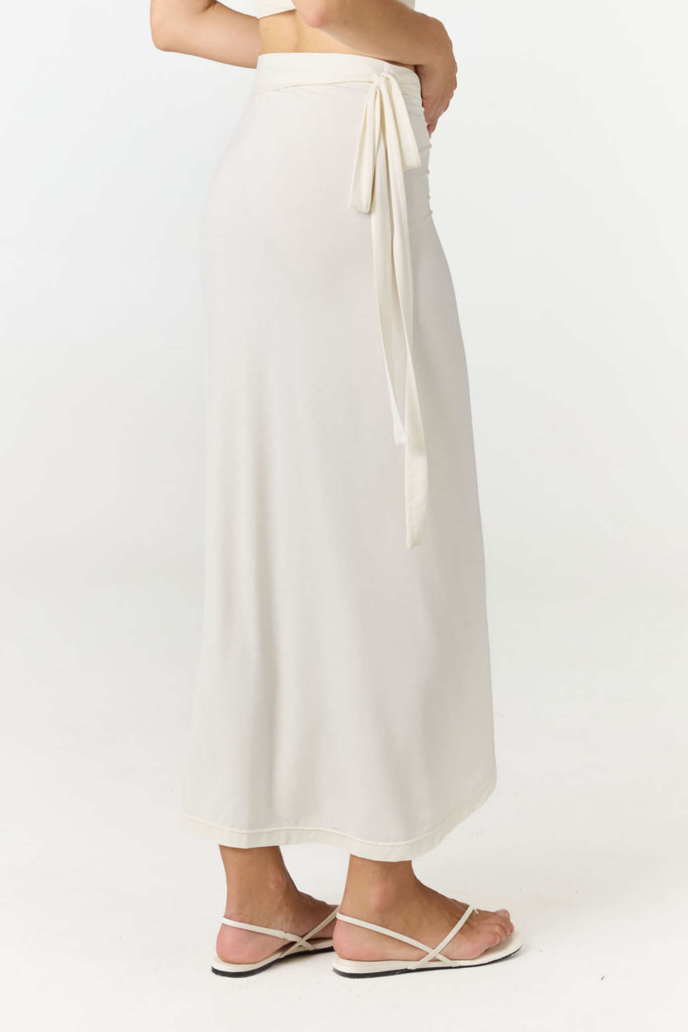 Step into summer with the flowy Soleil Wrap Skirt from AOCO. Featuring a lightweight fabric and an adjustable waist, this piece delivers effortless comfort.