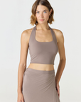 Refresh your summer wardrobe with the Mia Cropped Halter from AOCO. Featuring a chic halter neckline and a flattering cropped fit, it's a warm weather must.