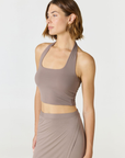 Refresh your summer wardrobe with the Mia Cropped Halter from AOCO. Featuring a chic halter neckline and a flattering cropped fit, it's a warm weather must.