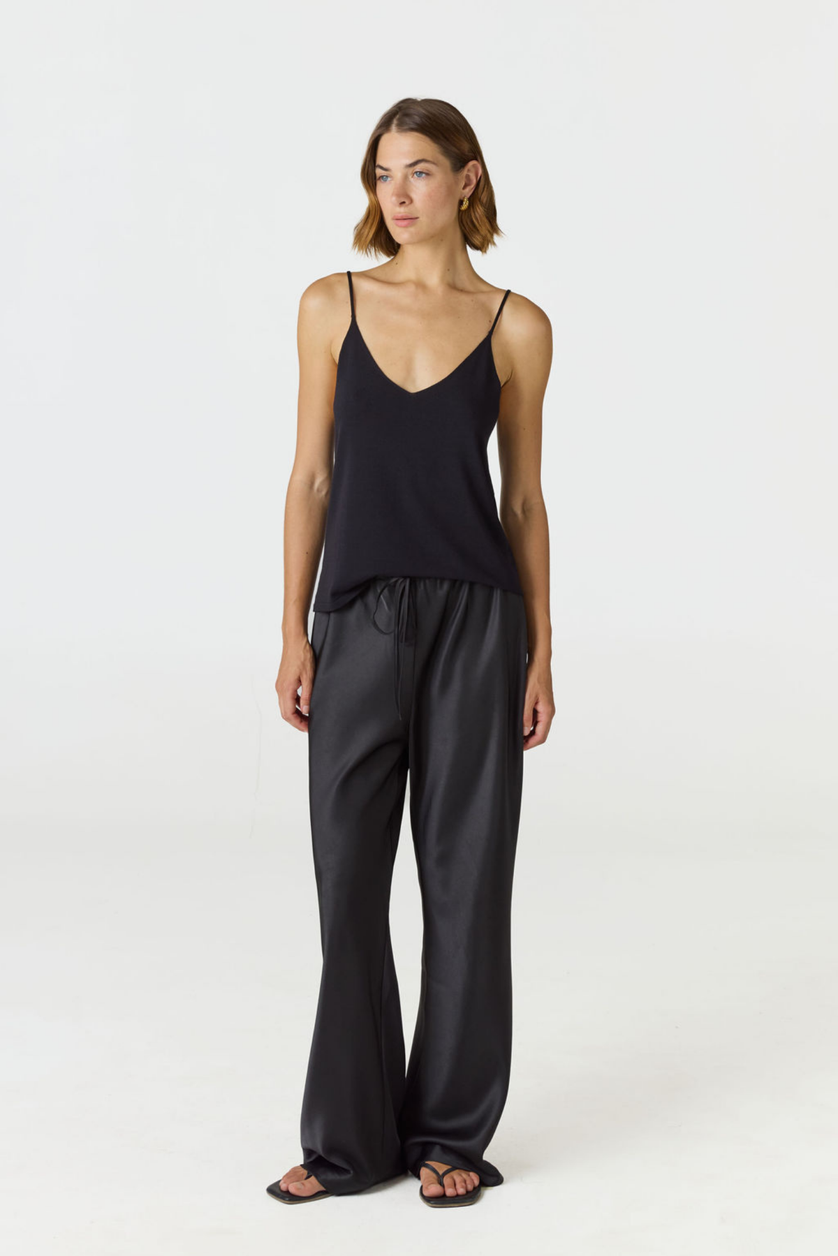 Upgrade your warm weather wardrobe with the Willow Knit Tank from AOCO. Crafted for breathable comfort, this versatile sleeveless top brings effortless style.